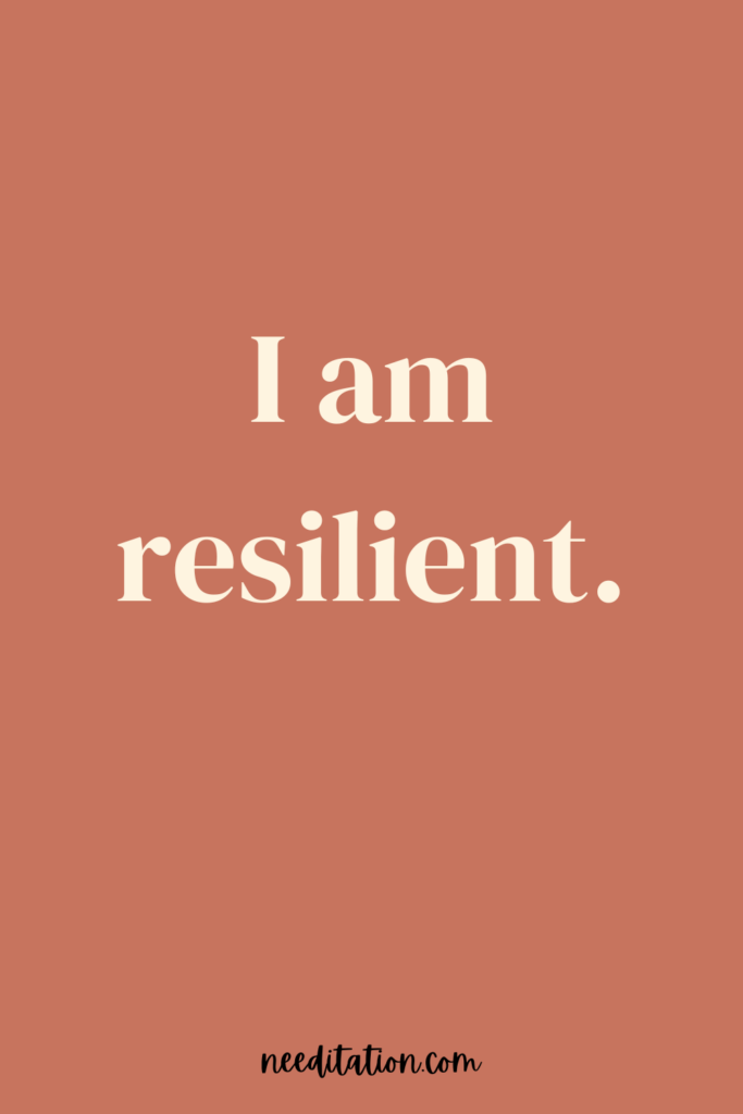 a short positive mantra on a red background that reads "I am resilient"